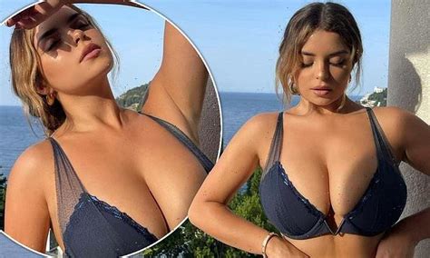 Demi Rose Flaunts Her Very Ample Assets In Sizzling Navy Lingerie