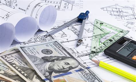 A Blueprint Of An Architect With Money Calculator Symbolic Photo For