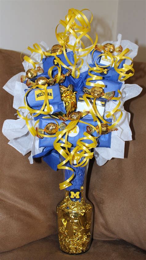 What gift to send when someone dies. Michigan Wolverine Candy Arrangement....someone should ...