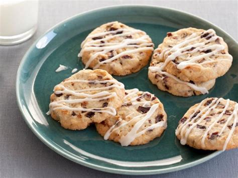Stir the jam to soften and spread a teaspoonful of it over the bottom of the base cookie. Dried Cherry and Almond Cookies with Vanilla Icing Recipe ...