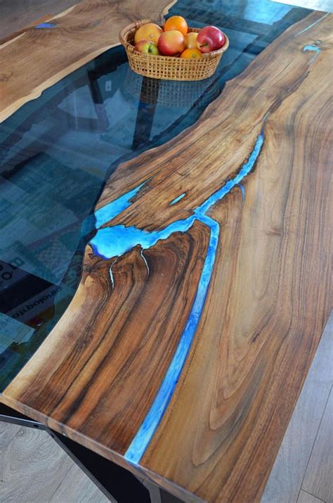 A live edge epoxy table can brighten your living space in an instant. Live edge river dining table with bench and glowing resin ...