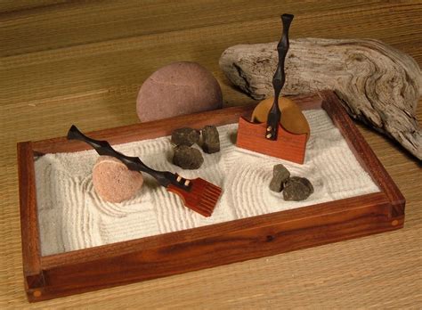 Rake ripples or swirls in it with the wooden zen rake. japanese rock garden rake amazing ideas 9 on garden design ...