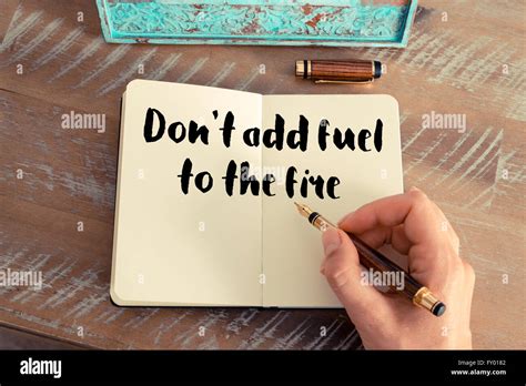 Handwritten Quote Dont Add Fuel To The Fire As Inspirational Concept