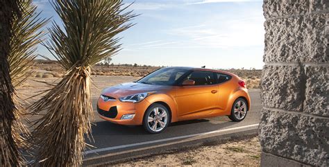 How much is a new car door. New for 2012: Hyundai Veloster 3-Door Compact Coupe - Down ...