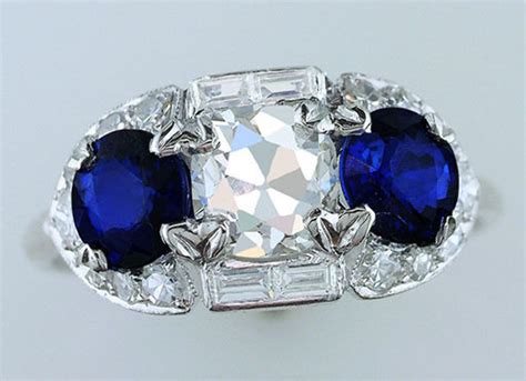 Vintage edwardian ring with a lovely old mine cut center diamond weighing approximately.70 of a carat (approximately h/i color and si clarity) with an additional diamonds weighing.06 of a carat and 4 dark blue scissor cut sapphires (given the age of the ring the sapphires are most likely synthetic as. Vintage Antique GIA Certified 4ct Diamond Sapphire Platinum Deco Engagement Ring