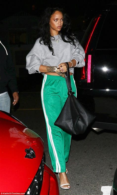 Rihanna Flaunts Her Toned Abs In A Crop Top And Silk Gym Trousers