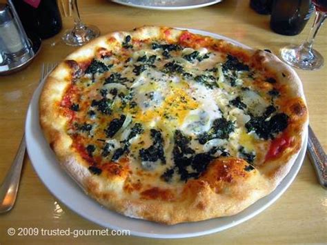 Unroll refrigerated bistro pizza dough on enclosed parchment paper and place on a baking sheet or pizza stone. pizza | Trusted Gourmet