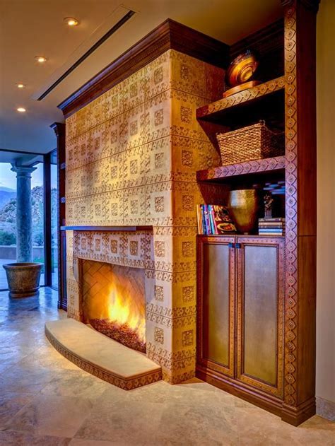 It stores firewood, holds a tv, and even acts as a guardrail for the staircase. Living Room Fireplace : Designers' Portfolio : HGTV - Home ...