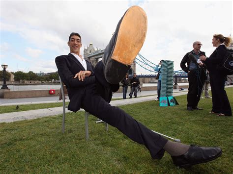Worlds Tallest Man Sultan Kosen Stops Growing Photo 1 Pictures
