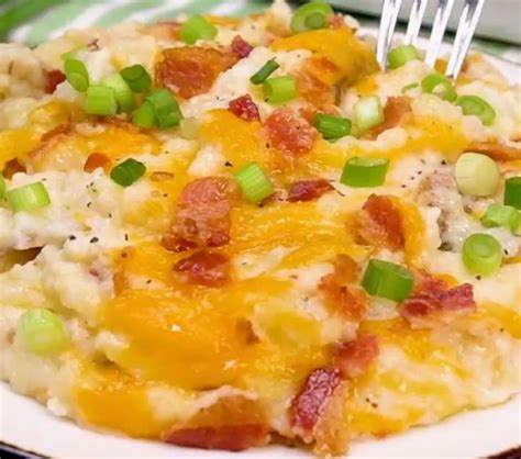 With a whole lot of decadence packed inside — bacon, cheddar, butter, sour cream — this potato casserole defines comfort food. The Pioneer Woman's Twice Baked Potato Casserole