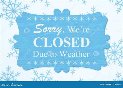 Sorry We Re Closed Due To Weather Message On A Wood Sign Stock Image