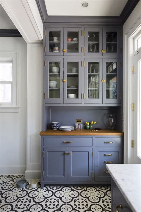 Cabinets that rise up all the way to the ceiling are impressive and provide a welcome framing effect for a kitchen. Before and After: A White-and-Gray Kitchen Renovation ...