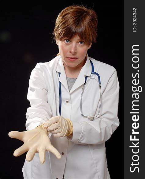 Nurse Putting On Latex Gloves Free Stock Images And Photos 3924342