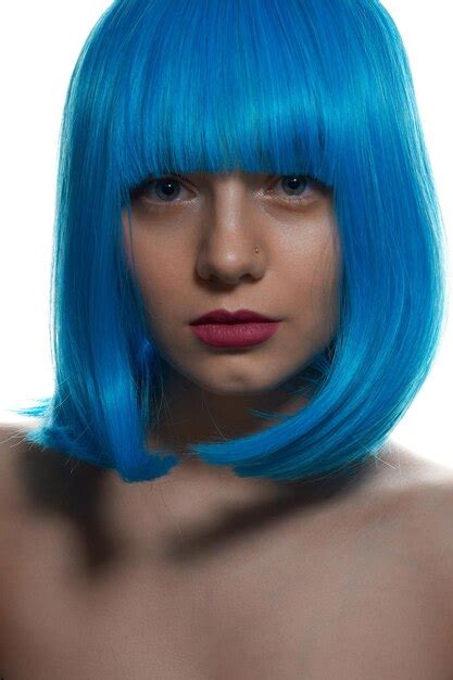 Premium Photo Portrait Of A Young Girl With Blue Hair On A White