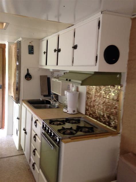 These clients chose to display clean,white dishes and clear glass wine glasses to create an elegant look and feel. Kitchen remodel...1973 Coachman | Kitchen remodel, Kitchen ...