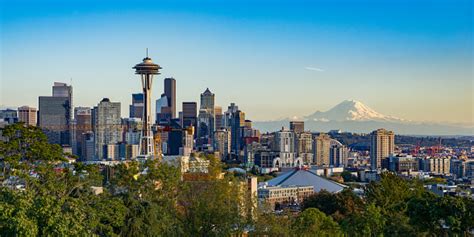 Seattle Skyline With Mt Rainier In The Background Stock Photo