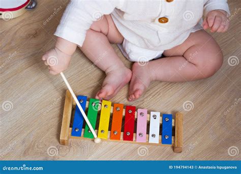 Baby Playing Xylophone Tambourine Kids Musical Instrument Toy Stock
