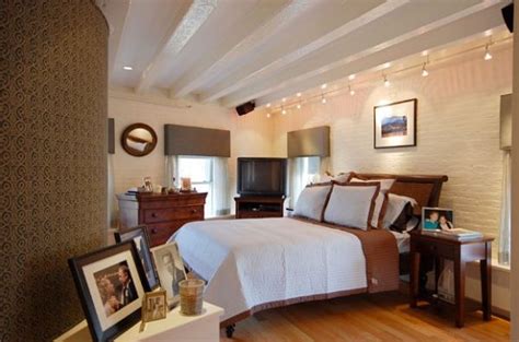 It can be suspended or flush mounted to mold to the difficult ceiling shape, and the easy adjustability high ceilings create shadows and vaulted ceilings often have exposed beams that can add to that. Gorgeous track lighting for contemporary bedroom