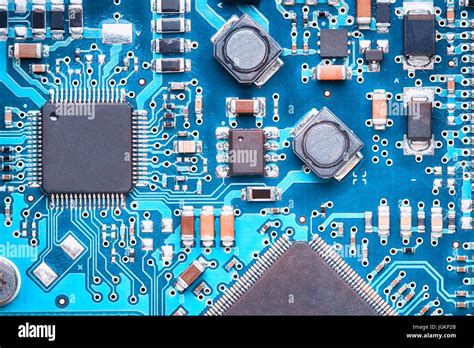 Macro Top View Of A Printed Circuit Board With Processors Capacitors