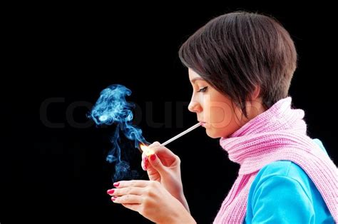 Junges Mädchen Rauchen Auf Schwarz Stockfoto Colourbox