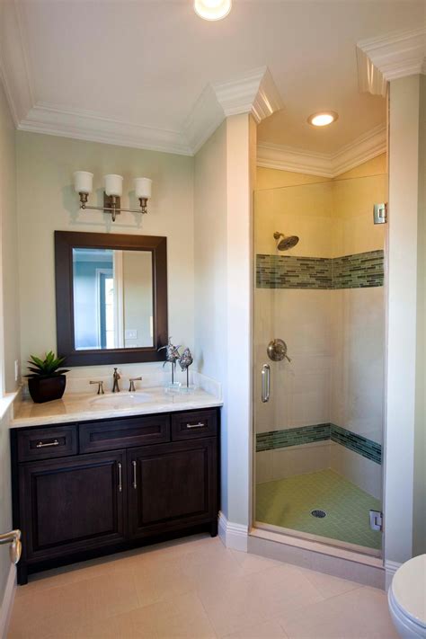 This Simple Guest Bathroom Features A Walk In Shower And Dark Brown Vanity To Give The Space A