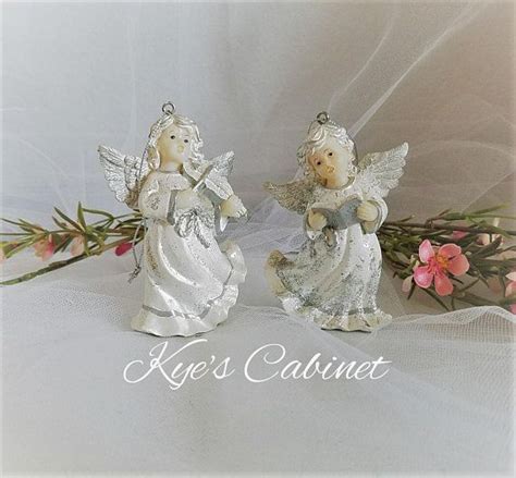 Browse 1,437 silver angels stock photos and images available, or start a new search to explore more stock. Musical Porcelain Angels Christmas Ornament Set of Two ...