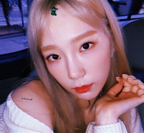 taeyeon reveals her new neck tattoo and the deep meaning behind it koreaboo