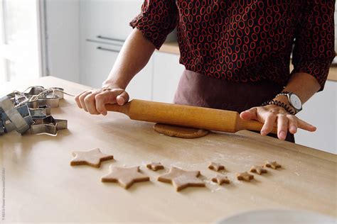 Crop Woman Rolling Gingerbread Dough By Stocksy Contributor Danil Nevsky Stocksy