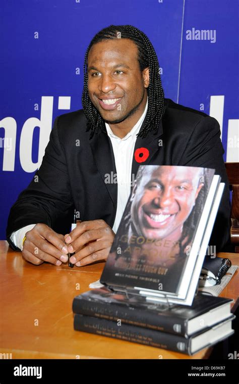 Former Nhl Player Georges Laraque Signs His Latest Book The Story Of
