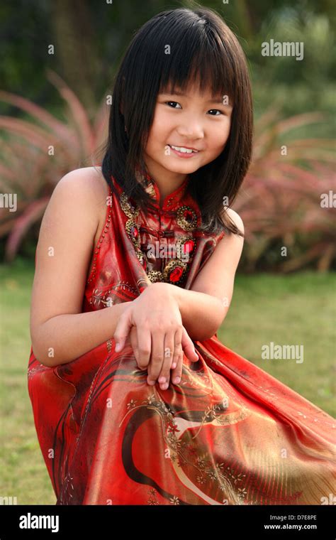 Outdoor Portrait Of An Asian Little Girl Stock Photo