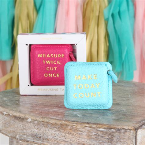 Create a catchy slogan with the slogan generator tool. Textured Slogan Tape Measure In Gift Box By Red Berry ...