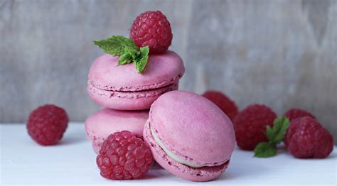 2560x1440 Resolution Three Pink French Macaroons Surrounded By