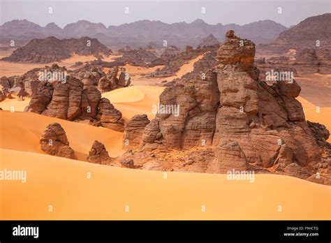 Sandstone And Dunes Jebel Acacus Libya Mountains In Sahara Desert