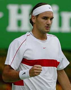 Roger federer remembers his eight wimbledon titles. Roger Federer