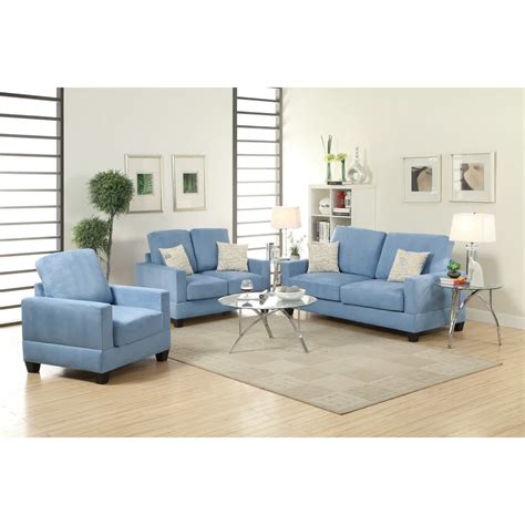 Pretty Blue Apartment Size Sectionals With White Accent Pillows Round Clear Glass Top Table With Metal Legs Grey Area Rug Round Transparent Glass Side Table With Metal Legs  