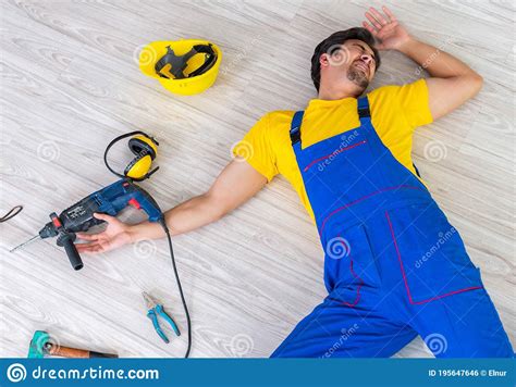 Injured Worker At The Work Site Stock Photo Image Of Employee