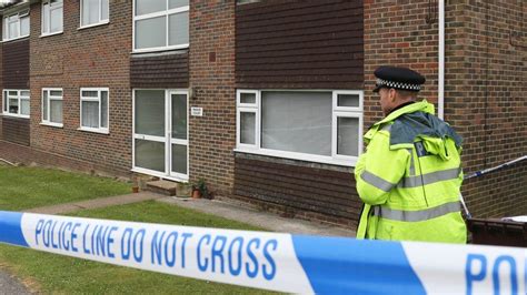 sussex murder probe after woman s body found in flat bbc news