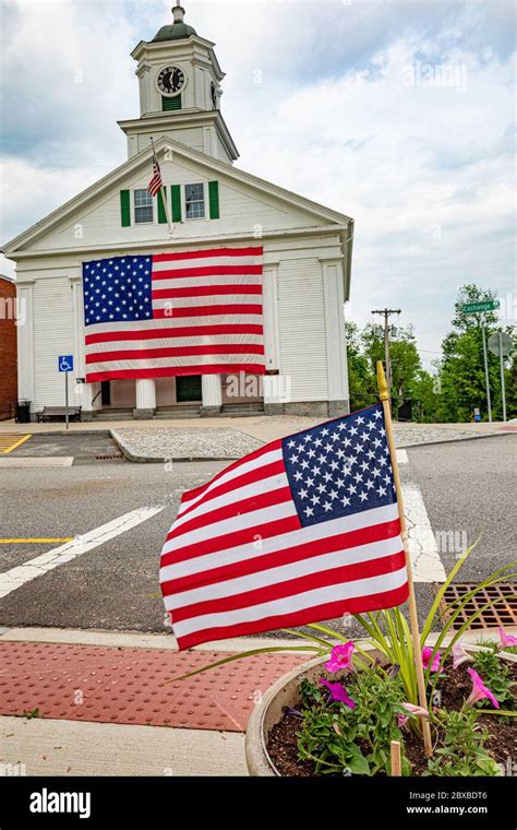 The Barre Massachusetts Town Hall With A Very Large American Flag