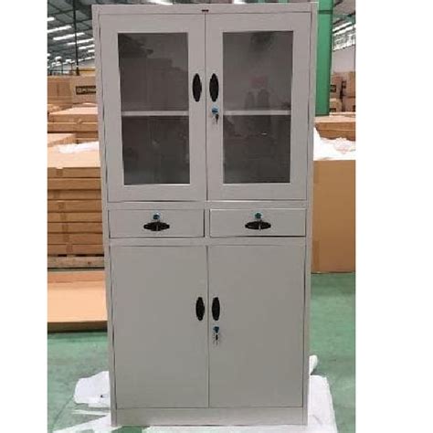Harga murah di lapak mebelonlinesurabaya. Lemari Arsip 1/2 pintu kaca dan 1/2 pintu besi dengan 2 ...