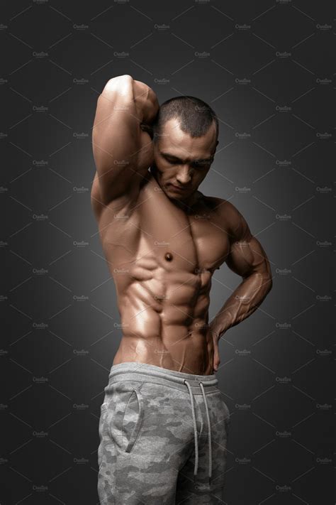 Strong Athletic Man Fitness Model Torso Showing Six Pack Abs Featuring