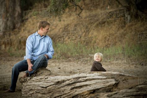 Caucasian Father And Son Enjoying Park Stock Photo Dissolve