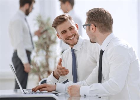Two Employees Talking In The Workplace Stock Image Image Of Employee