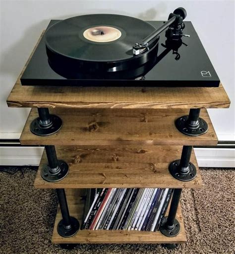 See more ideas about vinyl record holder, record storage, vinyl record storage. Rustic/Industrial Style Record Player Stand/Vinyl Storage in 2020 | Record player stand, Vinyl ...