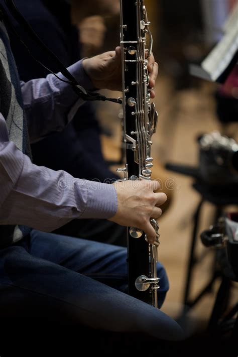 Hands Musician Playing Bass Clarinet Stock Image Image Of Light