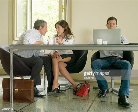 Flirting Under The Table Bildbanksfoton Och Bilder Getty Images