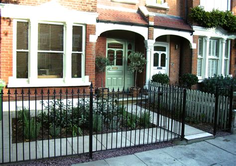 Our professionals design this railing system. black metal gate & railings, sandstone path | Garden railings, Front garden design, Front garden