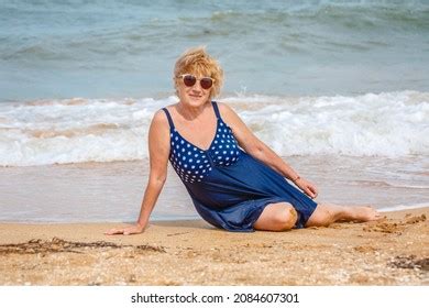 Happy Mature Woman Enjoying On Sea Stock Photo Shutterstock