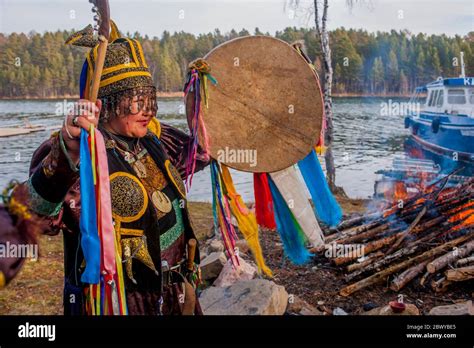 A Female Buryat Shaman Is Performing A Ceremony Near Irkutsk Siberia