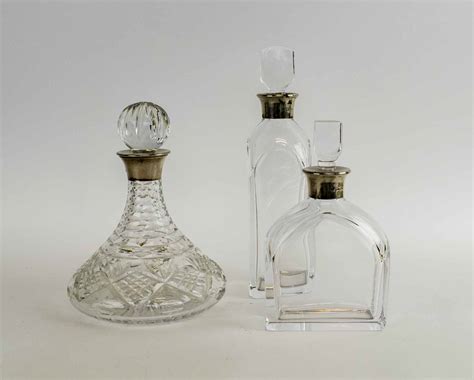 Three Asprey Silver Mounted Decanters 3