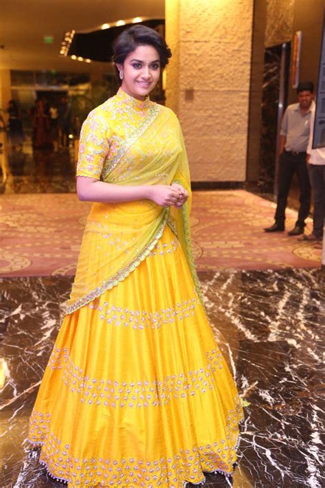 Actress Keerthy Suresh Stills In Yellow Dress At Movie Audio Launch